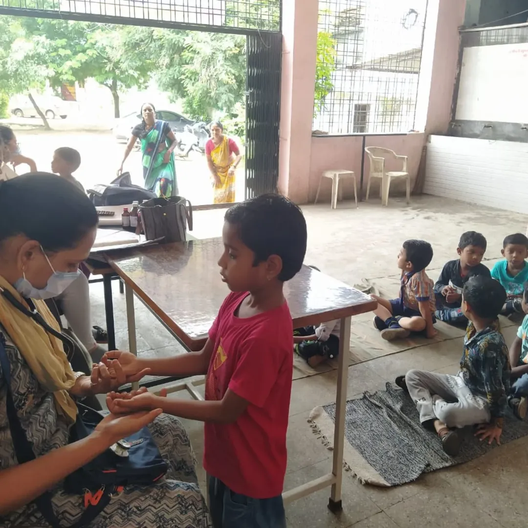 Doctor examining a student